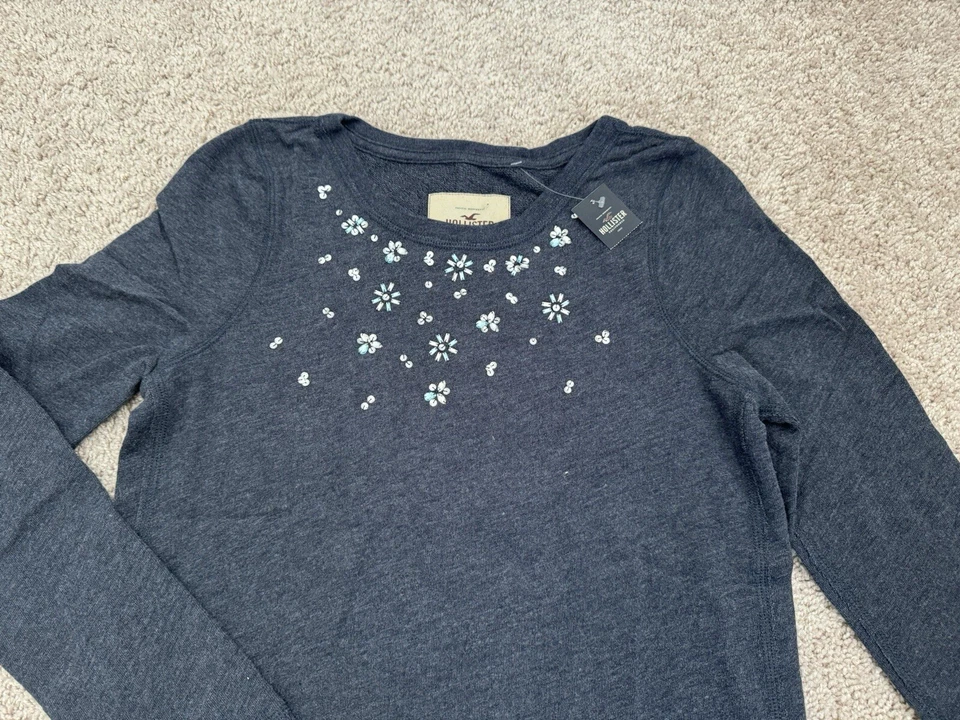 NUEVO CON ETIQUETAS Hollister Lentejuelas Escote con Cuentas Para Mujer Pullover Sudadera Azul Marino Talla S Foto 3 de 4