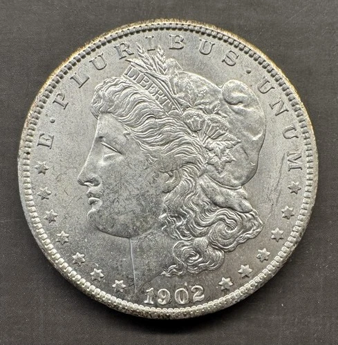 1902-O - Morgan Silver Dollar - 90% Silver - HIGH GRADE
