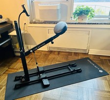 The DB Method Squat Workout Exercise Machine includes a 25lb. weight belt