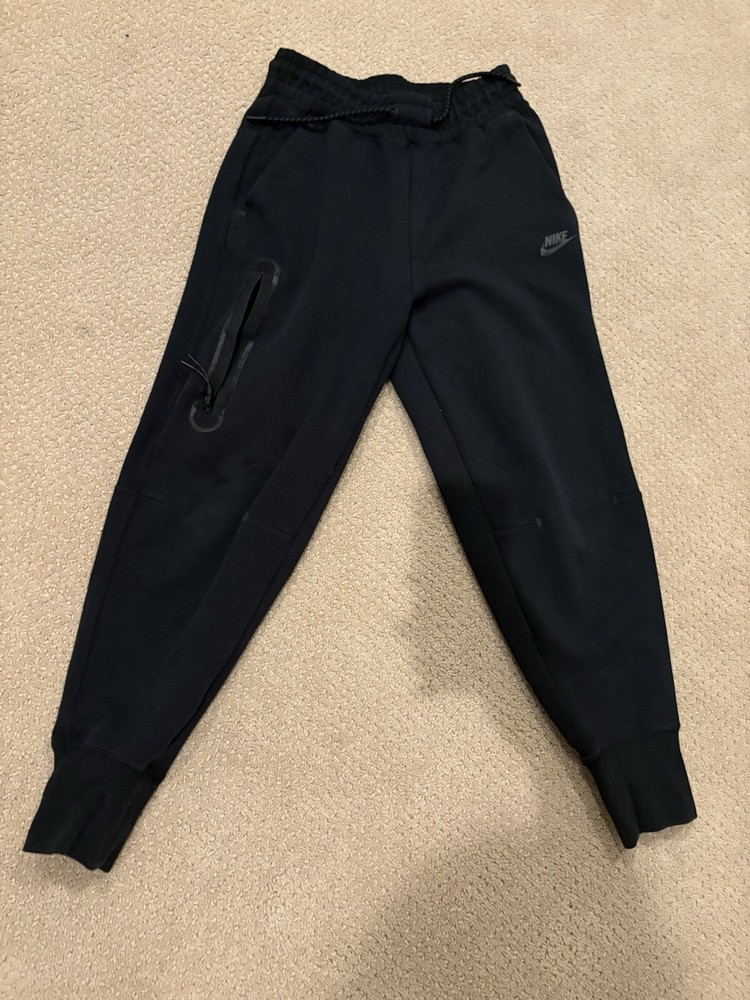 Discover the ultimate comfort and style with Nike Tech Performance Pants