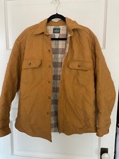 Tan, vintage Woolrich jacket. 100% cotton Made in the USA