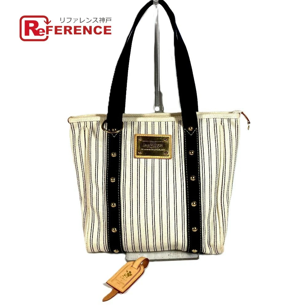 Vuitton — Louis Vuitton Antigua Hippo MM Canvas Shoulder Bag