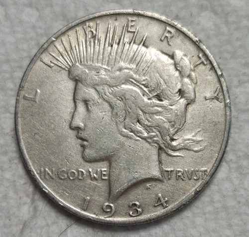 1934 S Peace Silver Dollar. Estimated Very Fine 35. Video M0070. Semi-Key Date.