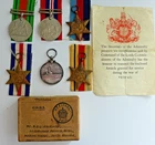 A GROUP OF MILITARY WW2 MEDALS INCLUDING A SILVER GEORGE VL ROYAL NAVY LONG SERV