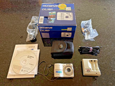 Olympus FE-180/X-745 digital compact camera, 6MP in silver, battery charger incl