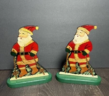 VTG Hand Made Folk Art Textured Santa Claus Skiing Christmas Dummy Board Set/2