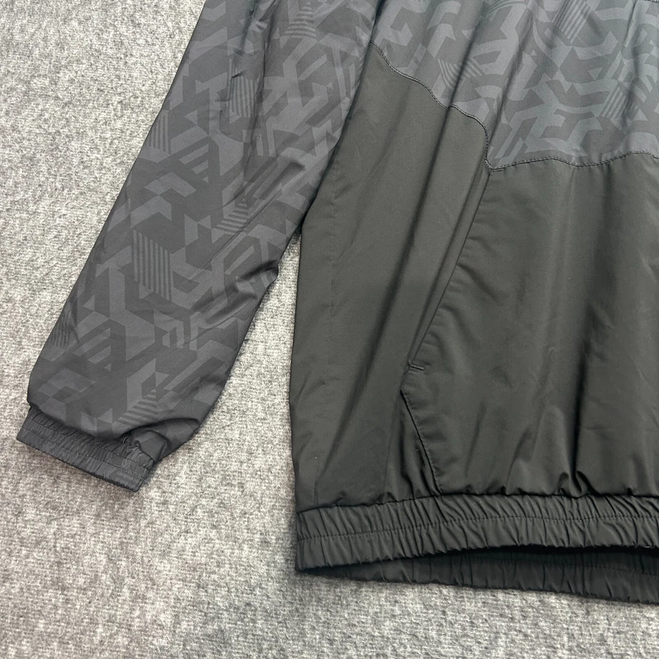 Chaqueta cortavientos Bridgestone Golf para mujer grande negra Tour B Foto 2 de 4