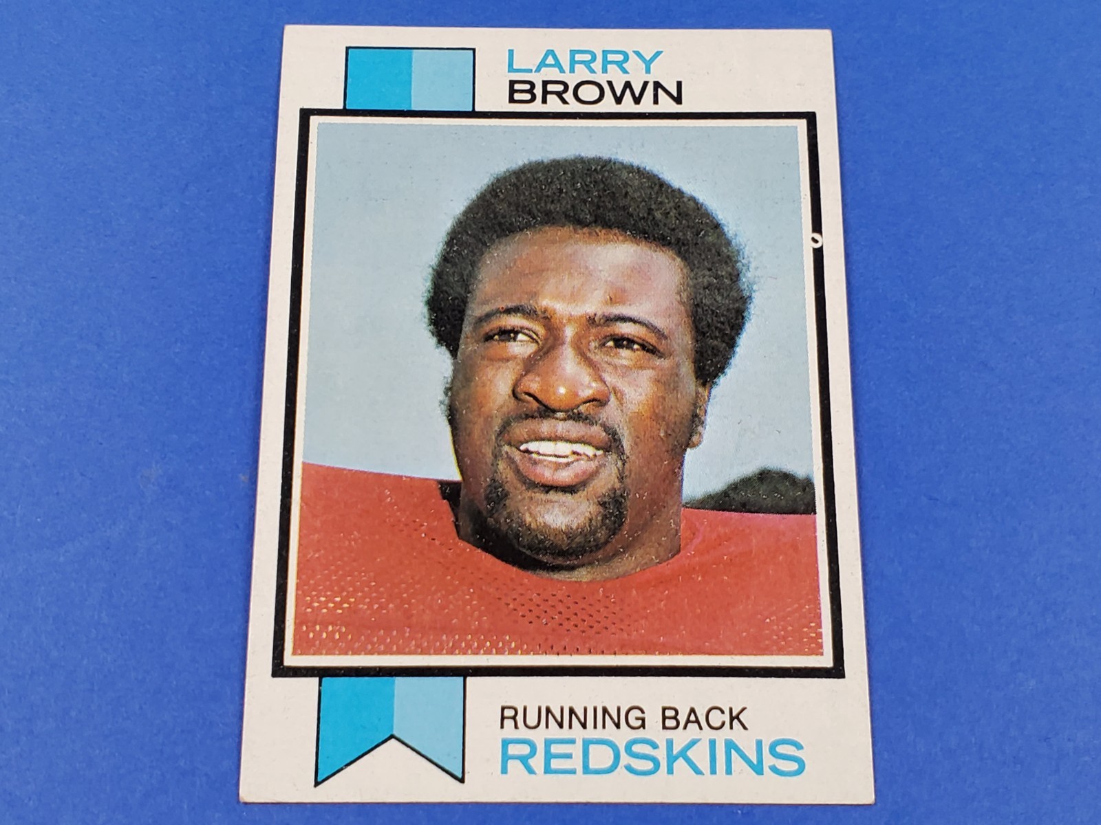 Larry Brown #220 (Football Cards 1973 Topps) — is it worth grading?