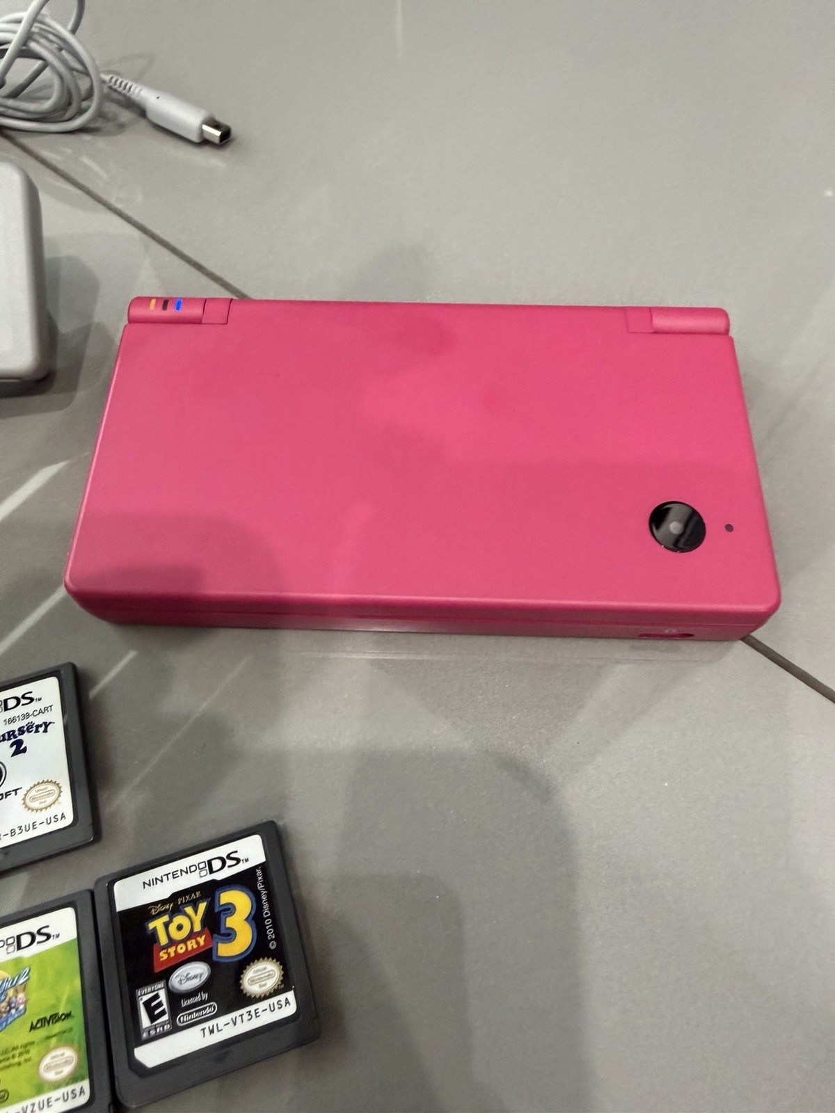 Nintendo DSi Pink Handheld System with 6 Games