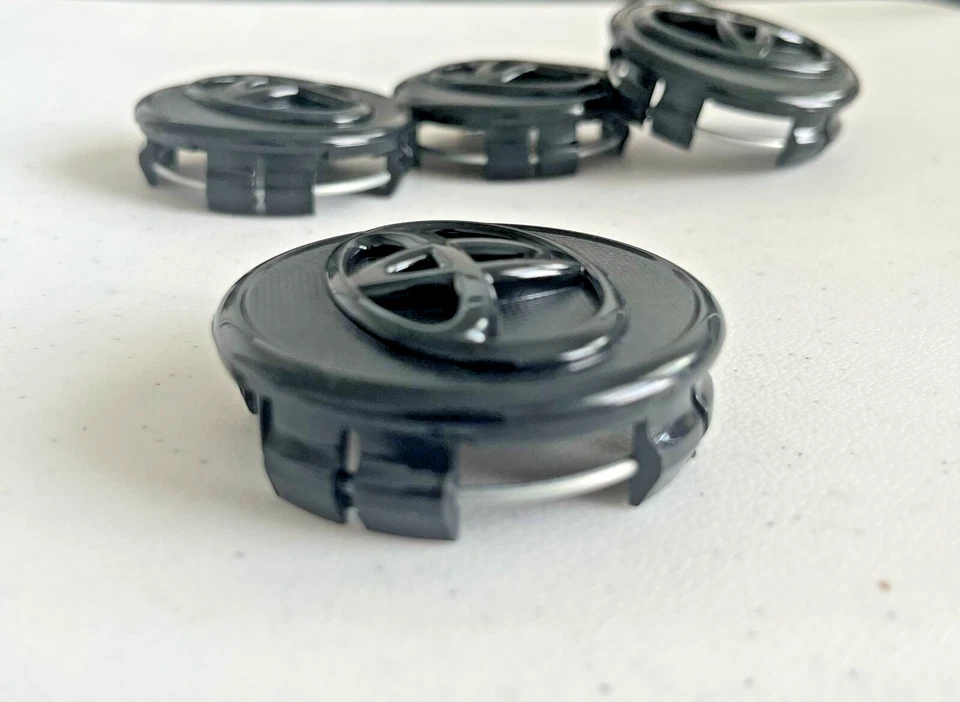 4 tapas centrales de rueda Toyota 57 mm negro mate con logotipo para Corolla Prius y Yaris Foto 2 de 4