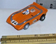 AURORA AFX #54 McLAREN CAN AM G-PLUS HO SLOT CAR 1970s IN ORANGE