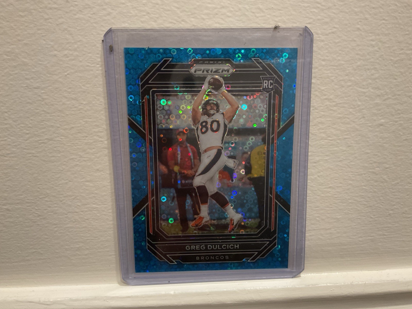 2022 Panini Prizm - Rookies Greg Dulcich #360 No Huddle Blue Prizm /79 (RC)