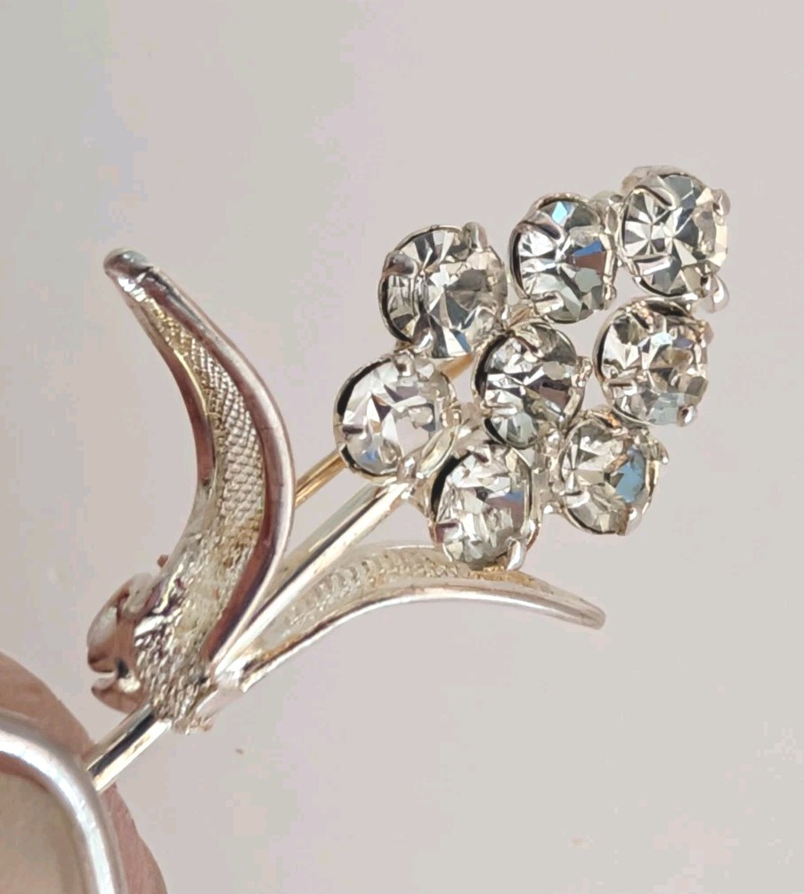 Vintage Rhinestone Floral Brooch Pin With Filigree Leaves In Silvertone
