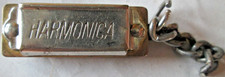 VINTAGE KEYCHAIN HARMONICA, BRASS  IRON, 1 1/2" X 1/2" X 1/2" UNBRANDED, USED
