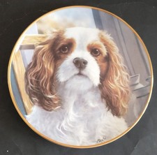 Five Danbury Mint Plates