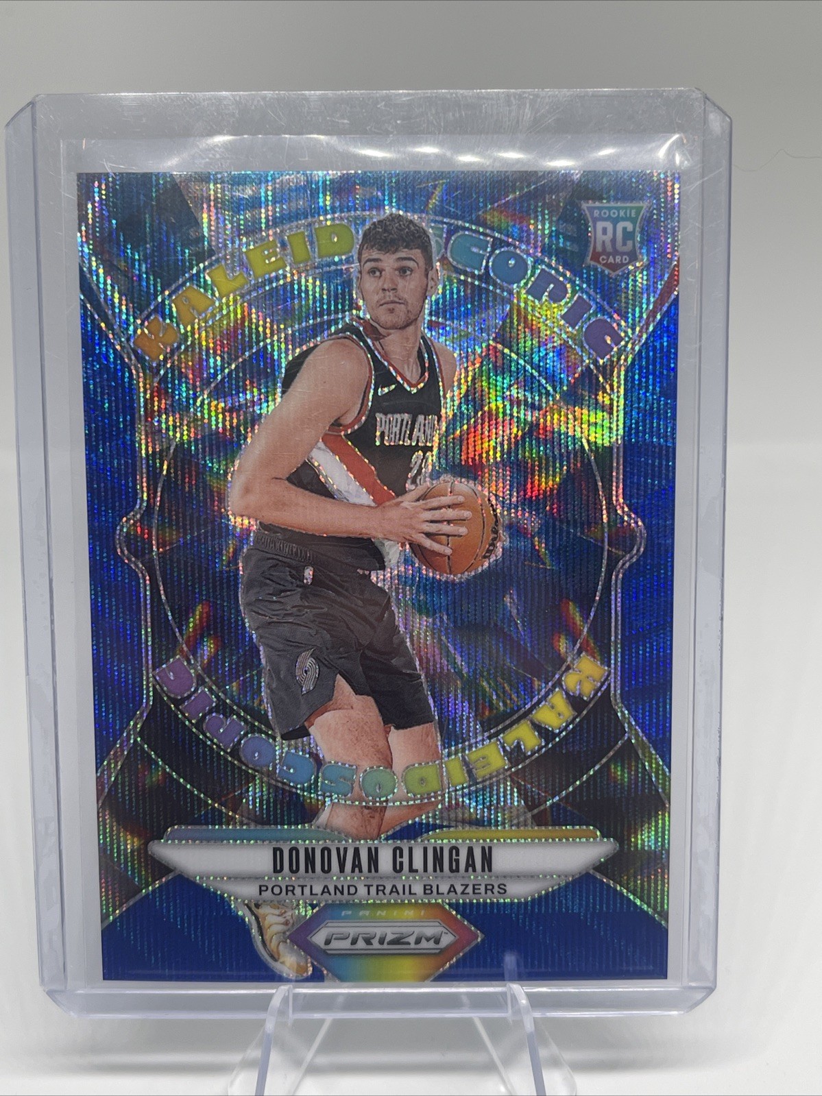 2024-25 Panini Prizm Kaleidoscopic Donovan Clingan #18 Blue Wave Prism /175 (RC)