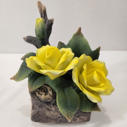 Yellow Rose of Texas music box turning ceramic figurine