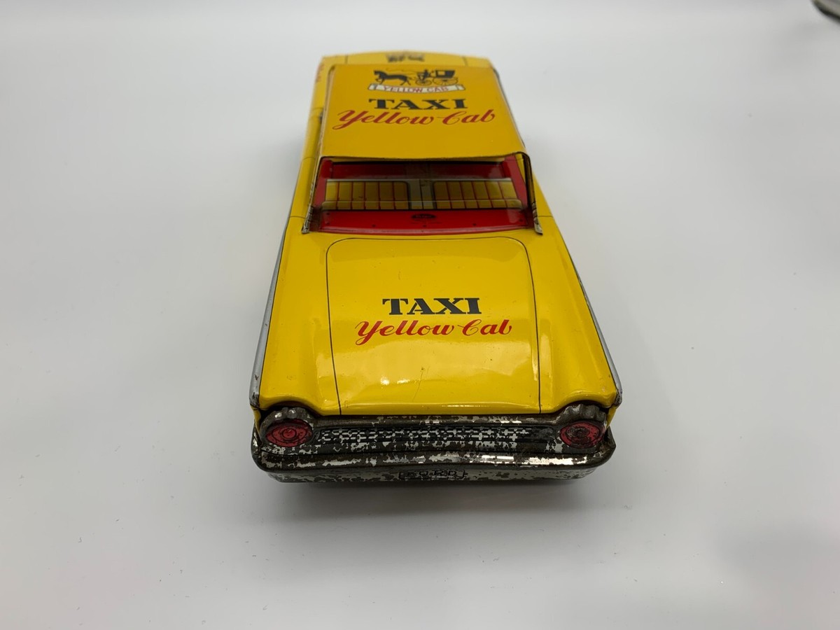 VINTAGE TAIYO WORLD TOY FORD YELLOW CAB TAXI TIN FRICTION
