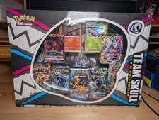 Pokemon TCG Team Skull Pin Collection Box Sigillato Evoluzioni Ombre Brucianti 