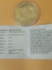 American Mint Presents: Life Of Abraham Lincoln Coin. cu, layered 24 k gold.