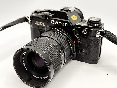 Canon AE-1 mit Canon FD 35-70mm 1:4 Spiegelreflexkamera #61180-95