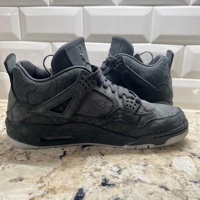 Air Jordan 4 Retro KAWS Mens 10.5 Black 930155 001 New no box or accessories. 