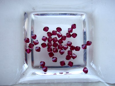 10 Swarovski  Kristall Perlen XILION Beads 6mm RUBY (501) Art. 5328