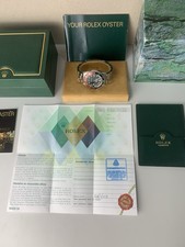 Rolex GMT-Master II "Coke" - 16710 Full Set 2003 with 2 extra bezel inserts