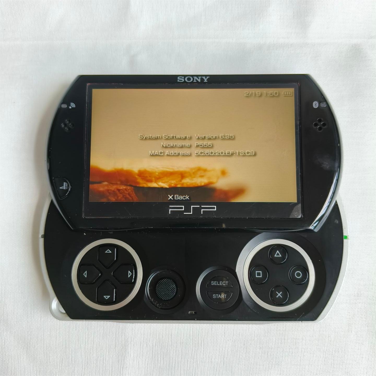 PSP GO console Black with Charger PSP-N1006 screen with protect Tested Well