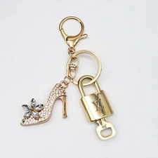 100% Auth Louis Vuitton Lock & Key with unbranded Bagcharm, Keycharm, Keychain