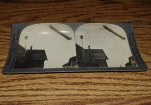 STEREO OPTICAL CARD # (18000) ZEPPLIN FLYING OVER A GERMAN TOWN