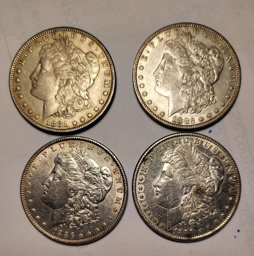 Lot of (4) 81-S, 82-S,86-P,89-P Morgan Silver Dollars no Reserve