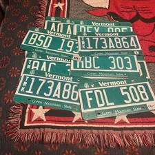 Vermont  license plate with RANDOM Number LETTER