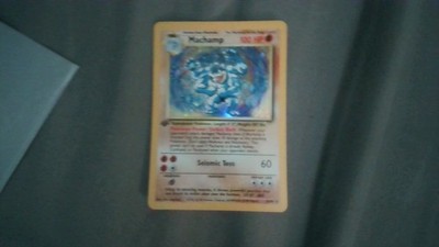 1st edition holo machamp pokemon card not that much damage on it