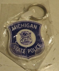 VINTAGE MICHIGAN STATE POLICE LOGO KEYCHAIN Drive 55 Buckle Up 2-1/2" Tl Rubber