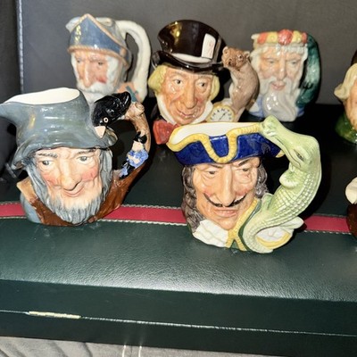 7 Royal Doulton characters jugs aka Toby jugs. Originated in 18th-century Englan