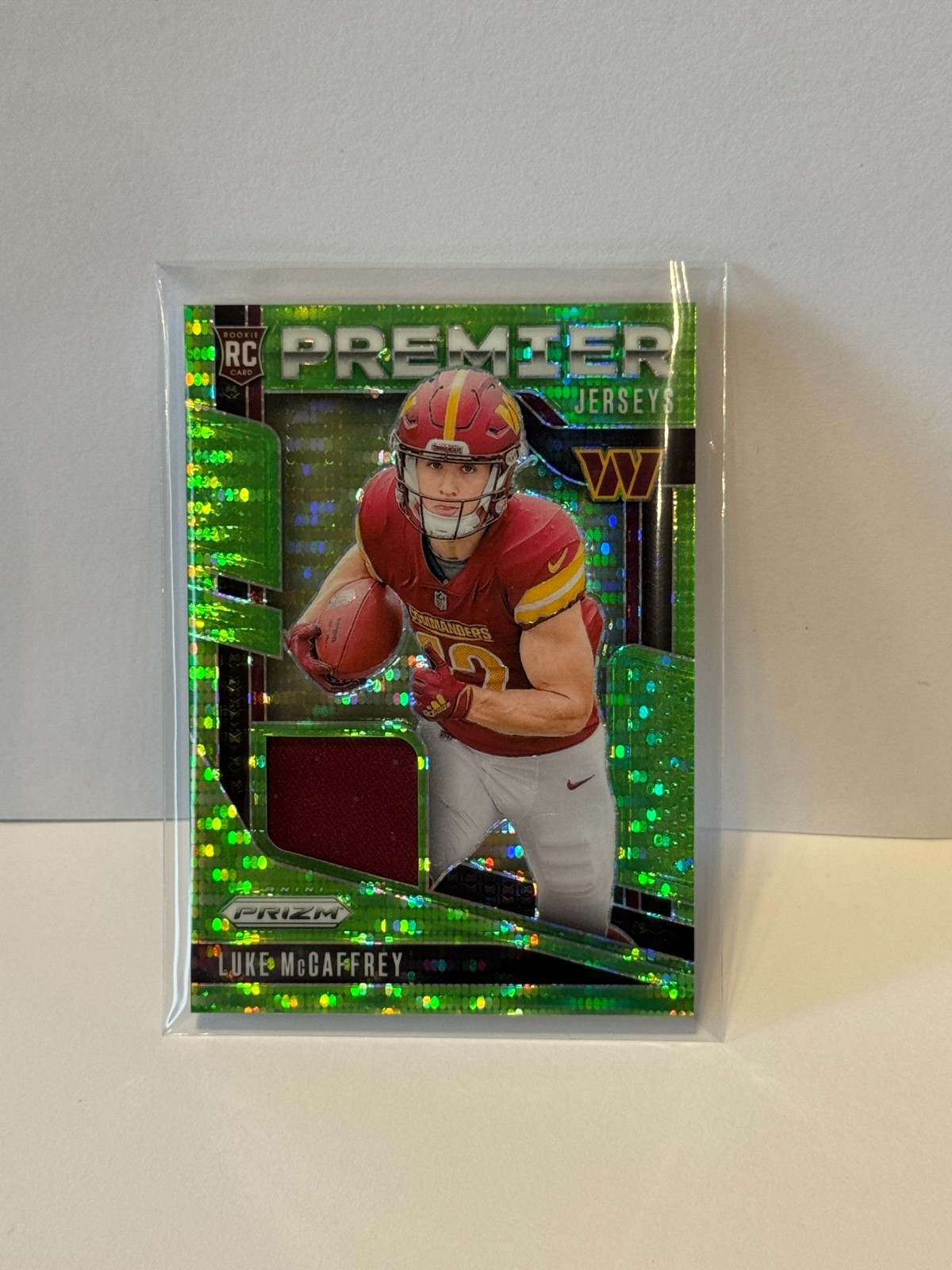 2024 Panini Prizm - Premier Jerseys Luke McCaffrey #PJ-LMY Neon Green Pulsar...