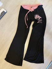pink and black flared leggings with graphic design size 14