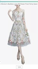 Pretty Sheer Overlay White Dress With Embroidered Floral Design.