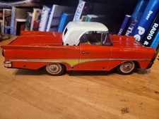 NICE RED NOMURA TIN LITHO  FRICTION POWERED  1958 FORD SKYLINER RETRACTABLE HDTP