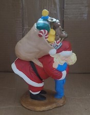 large cast iron santa hugging kid HEAVY