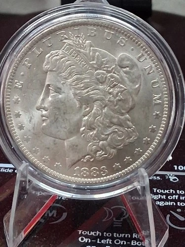 1883-O Morgan Silver Dollar Unc. in Capsule