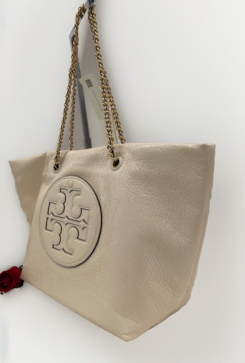 TORY BURCH ゴールド トートバッグ タッセル付 チェーン ロゴ TORY BURCH ゴールド トートバッグ タッセル付 チェーン ロゴ