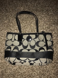 black and silver coach purse