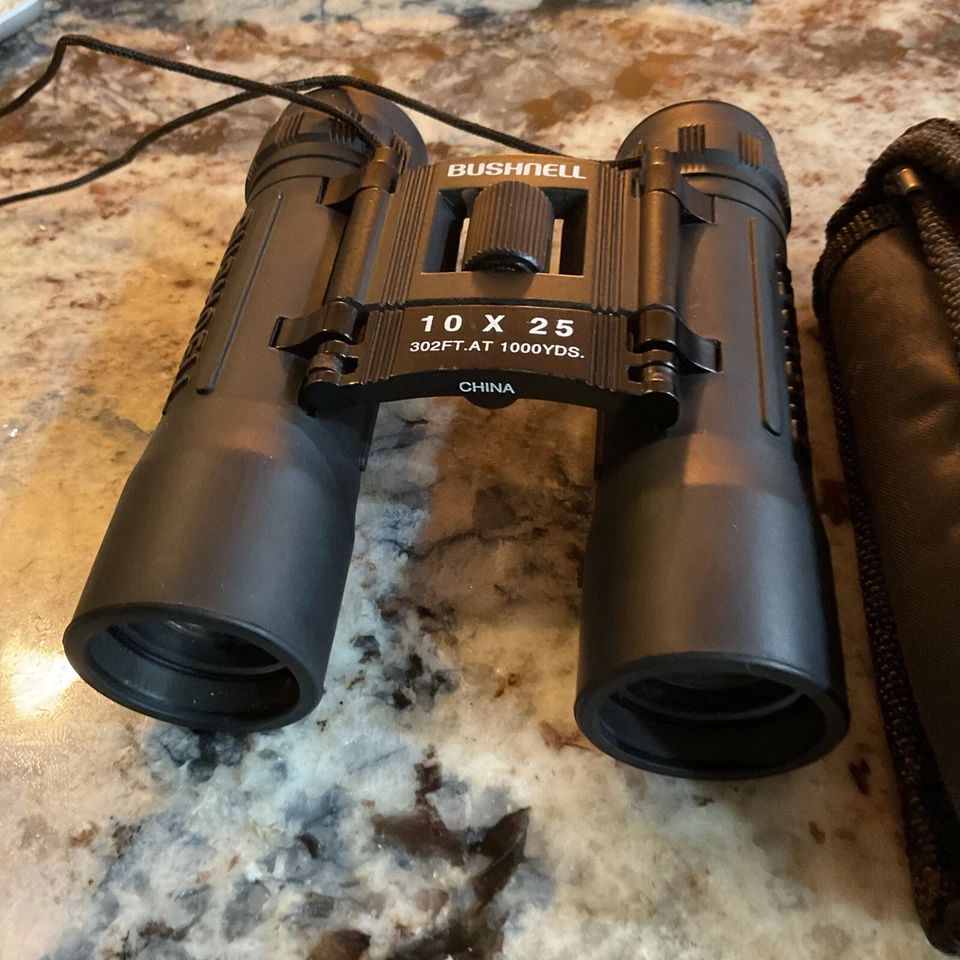 Bushnell 10 x 25 Binoculars  302 ft. at 1000 yds. -  w/case - EC - Image 2 of 3