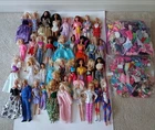Lot of 38 Vintage 90s Barbie Dolls with Clothes, Shoes & Accessories.