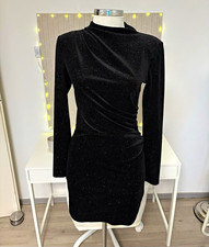 Damen-Kleid in schwarz mit goldenen Glitzerpu...