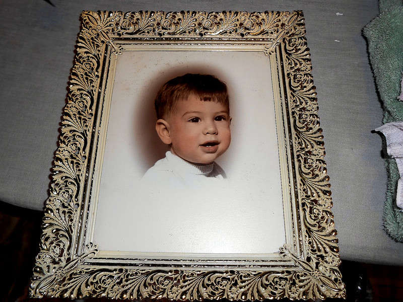 vintage, ornate gold-toned metal picture frame