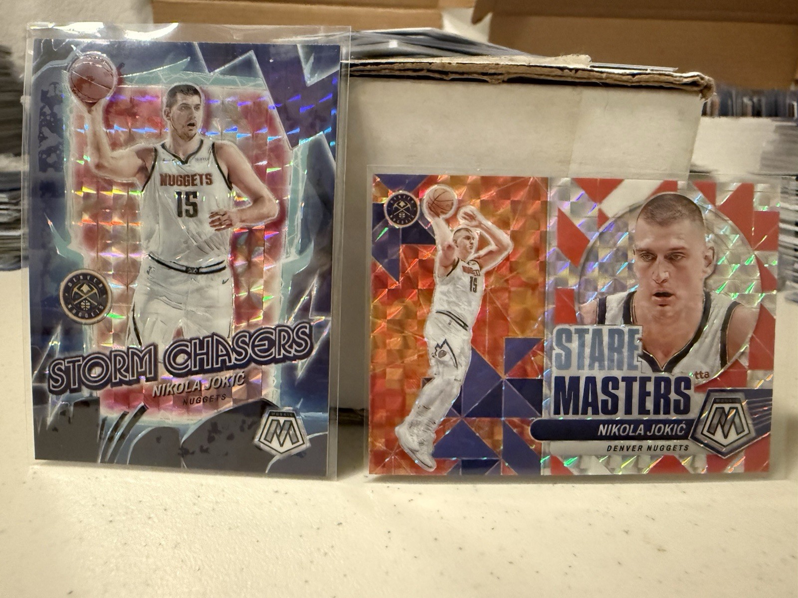 2023-24 Panini Mosaic NBA Nikola Jokic Storm Chasers Prizm #6 Stare Masters #11