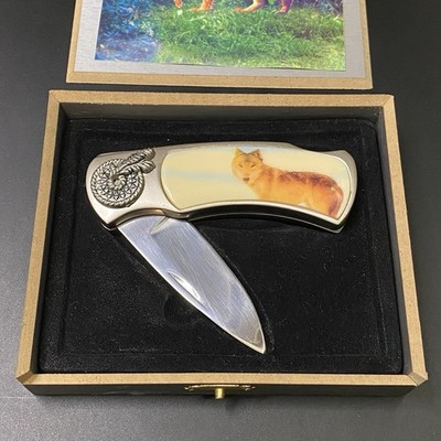 Preowned Pocket Knife with Wolf Design